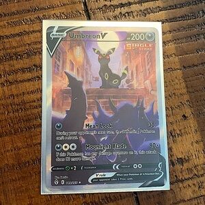 I am selling a near mint condition Umbreon v alternate full art